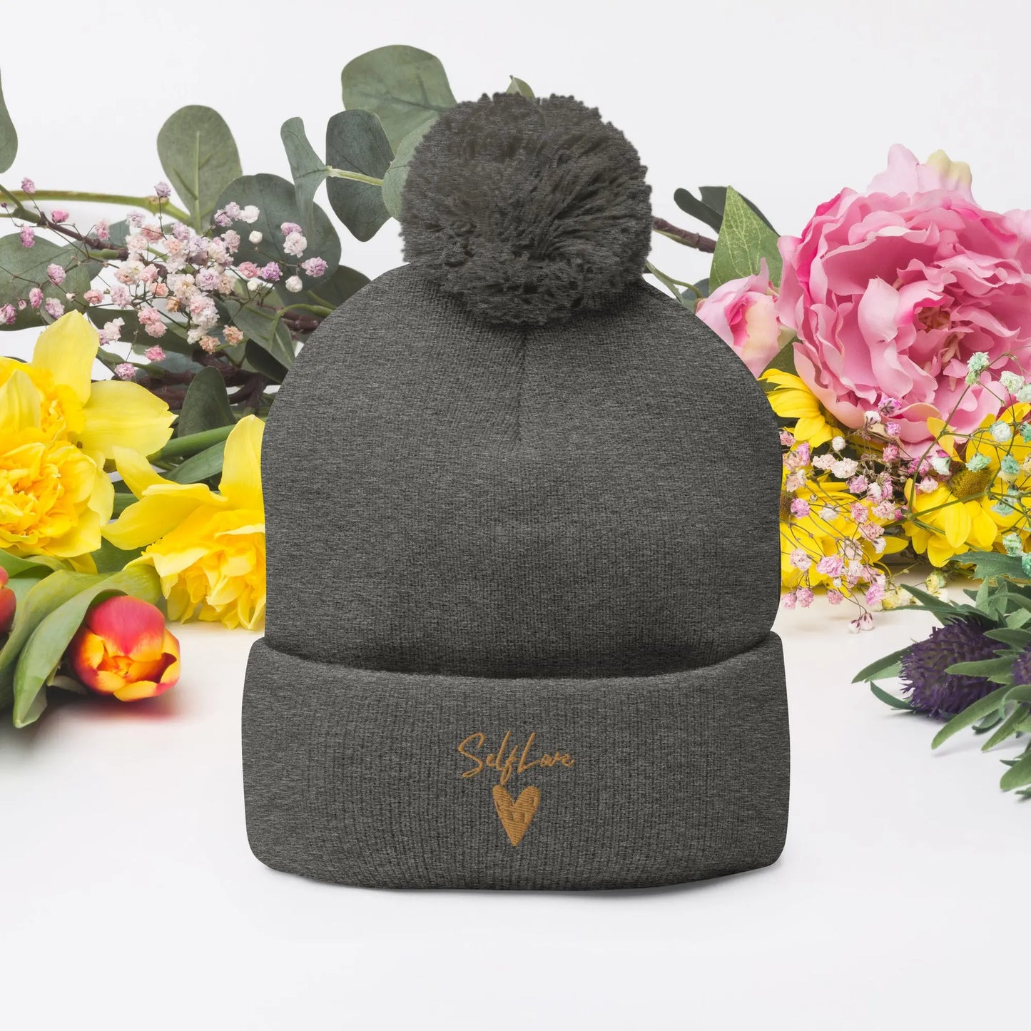 Hug Your Head: The Pom-Pom Hat That Can't Stop Loving Itself!